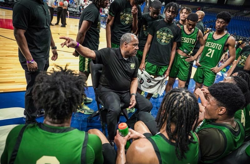 coach talking to players