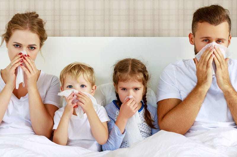 Family sick in bed