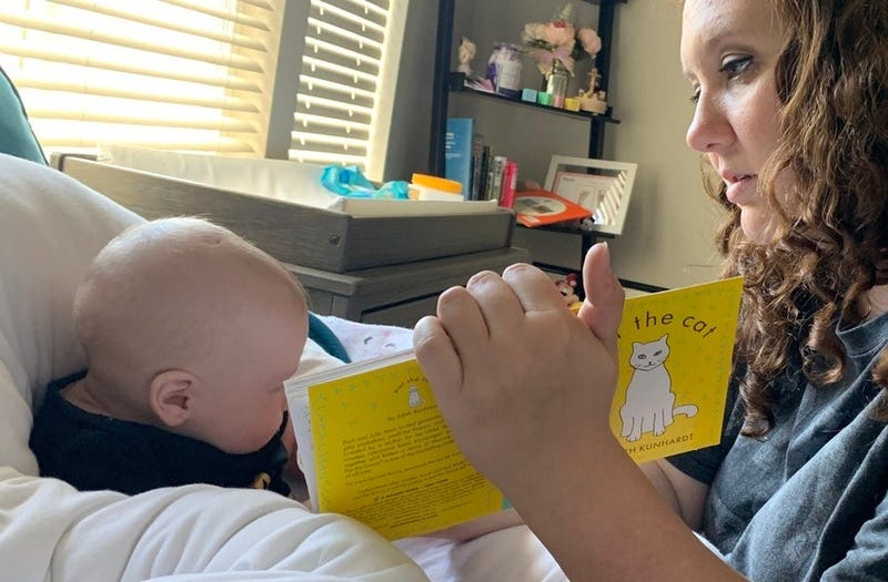 Kristen reading to Lilly