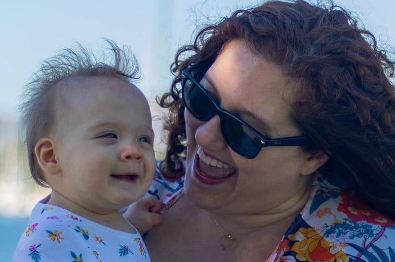 Mother holding child