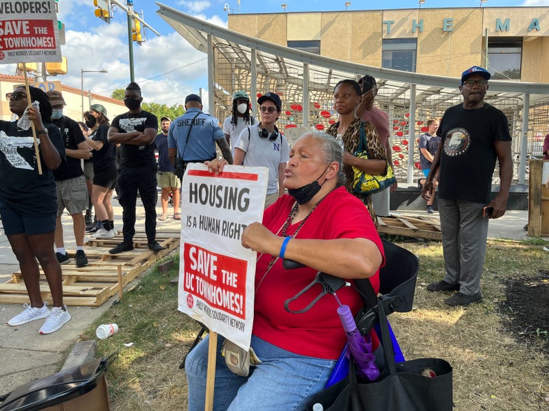 Resident Maria Lyles, who has lived in University City Townhomes for 25 years, watched from a distance as Philadelphia sheriff’s deputies followed through on a judge’s order to clear out the encampment in front of University City Townhomes.