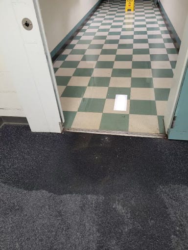 Water from burst pipe on the floor of the St. Louis County Jail.