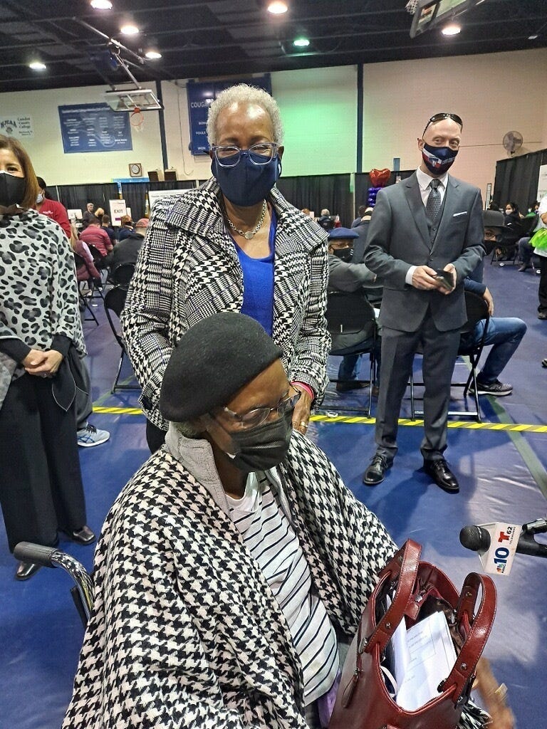 Ethernell Saxon (sitting), accompanied by her daughter Cathy (standing), received her second dose of the COVID-19 vaccine on her 100th birthday on March 10, 2021, in Blackwood, New Jersey.