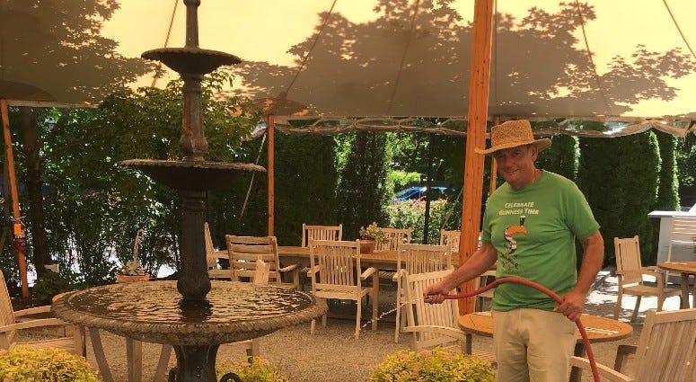 Pineville Tavern owner Andrew Abruzzese in the tent he bought for outdoor dining