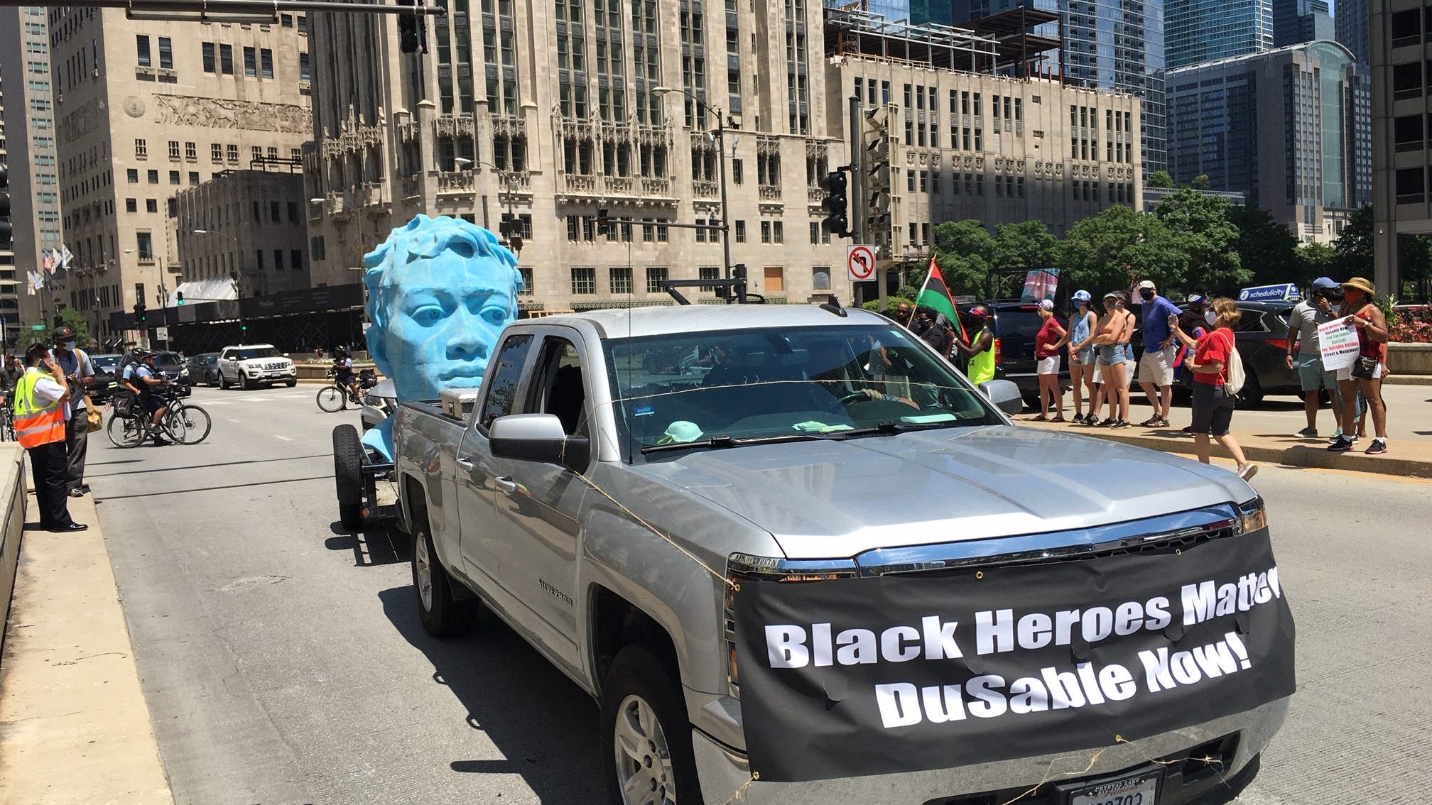 Black Lives Matter Marchers Call For A Long-Overdue City Recognition Of Jean Baptist Point du Sable