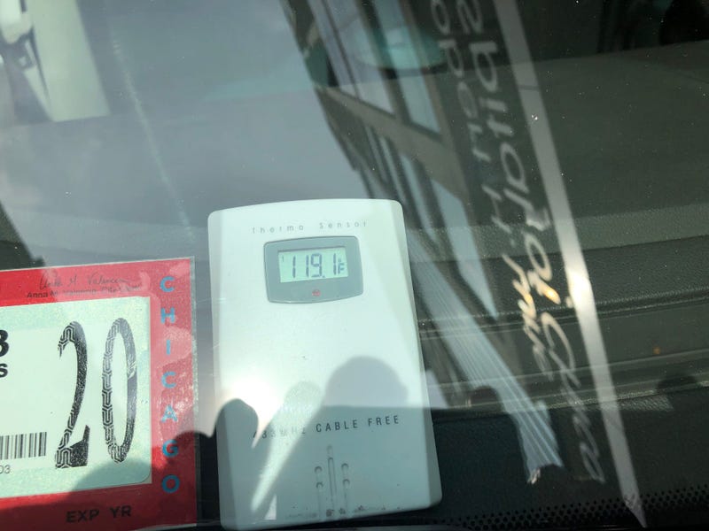 A thermometer placed in a car parked in the sun outside the hospital in the Streeterville neighborhood quickly went to 119 degrees - that was 20 degrees hotter than the air temperature at the time.   
