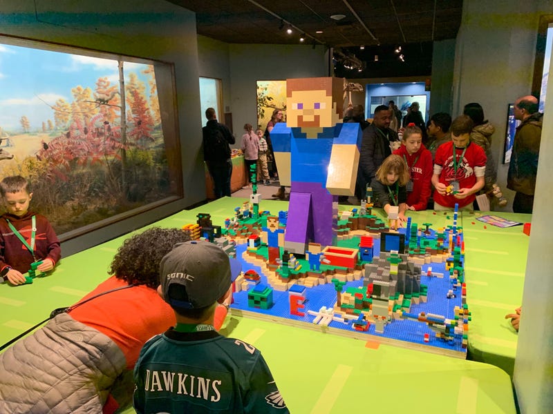 A Minefaire display allows Minecraft fans to build by hand.
