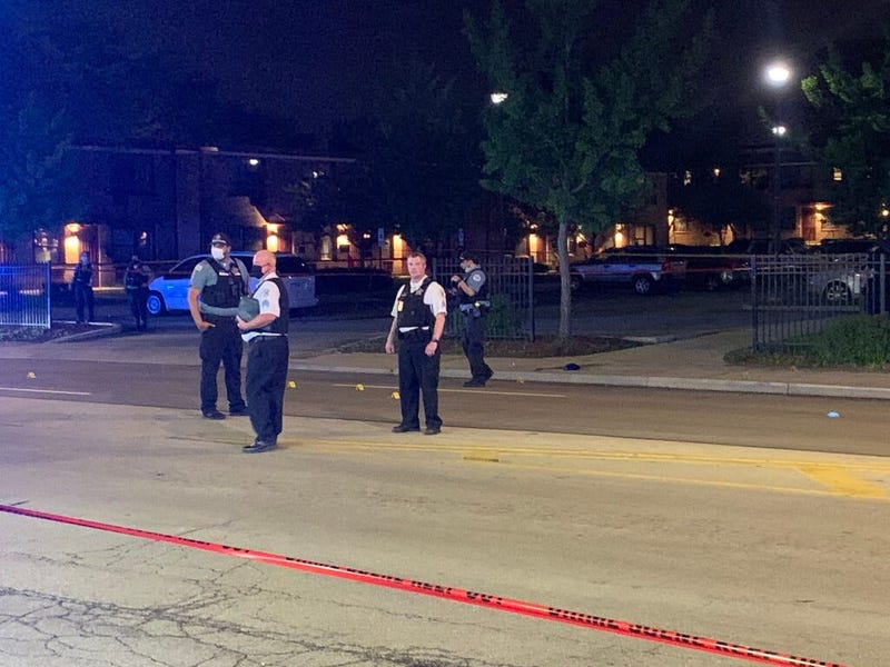 Chicago police at the scene where a 5-year-old girl and two teenage boys were shot May 26, 2020, in Wentworth Gardens.