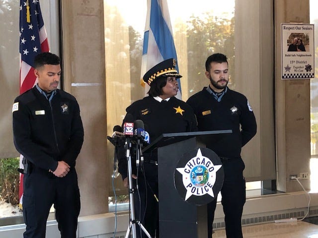 Two young Chicago police officers are being recognized for their actions at the scene of a fiery, roll-over crash with a child trapped inside.