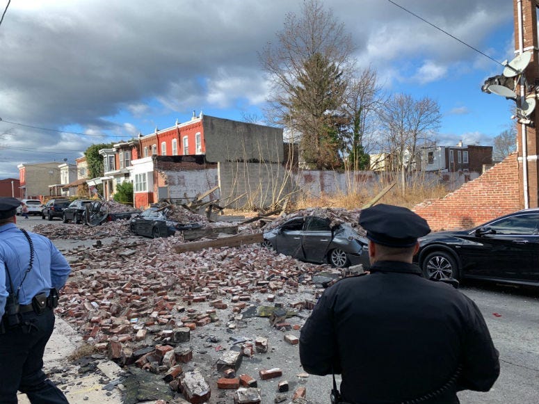 A brick wall collapsed in the 6000 block of Osage Avenue.