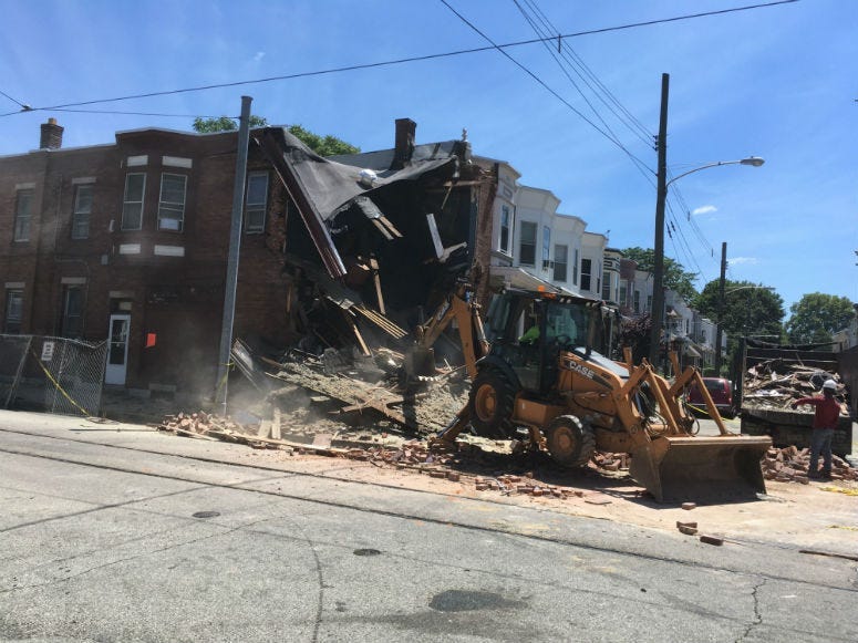 There was a partial rowhome collapse Monday in East Mount Airy at a small intersection where a flatbed truck drove into its living room. 