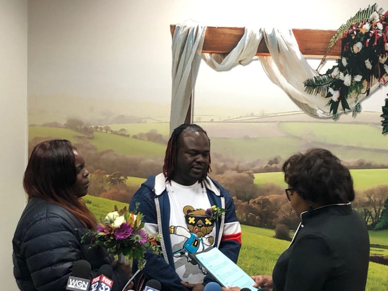 Demarco Johnson and Jasmin Blackman showed up to the Daley Center at midnight to be the first couple in line for a marriage license. They were later married during a ceremony performed by Clerk Karen Yarbrough in front of the press.