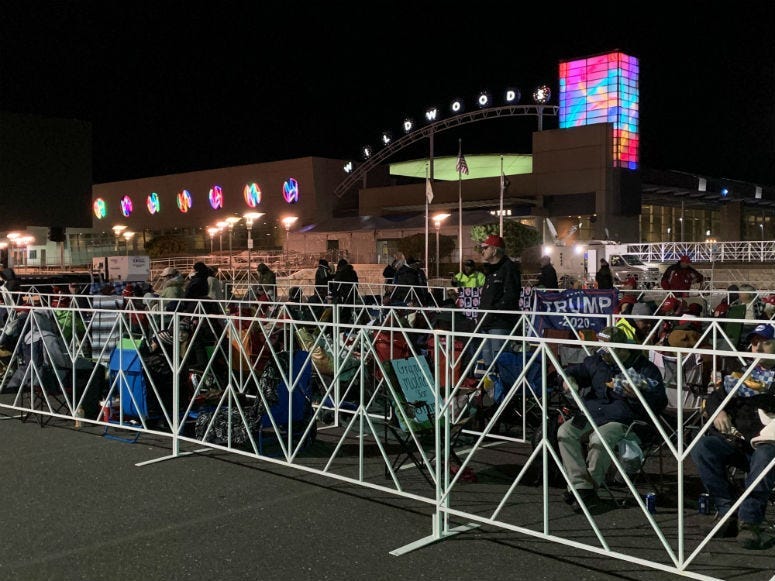 People camp out outside the Wildwoods Convention Center, waiting for President Trump's visit.