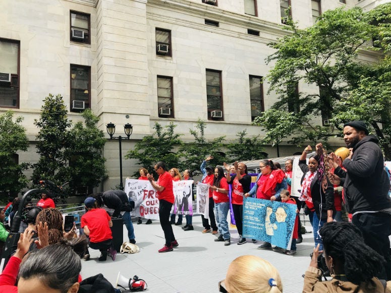 A troop of women in red took over the City Hall courtyard Tuesday afternoon to rally for an end to Philadelphia's cash bail system, and for some, it was a day of celebration. 