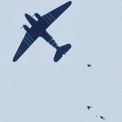 Jumpers exit a C-47 over Normandy on the 75th Anniversary of D-Day