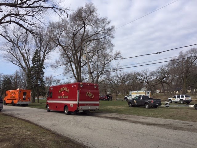 Officials are still searching for a woman after pulling a man’s body from the DuPage River Monday morning near southwest suburban Shorewood.