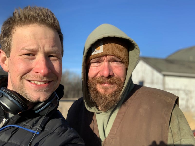 Dairy farmer Dustin Melius with Riggs