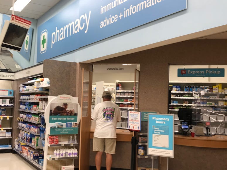 Local Resident Visits Pharmacy - Emily Gill