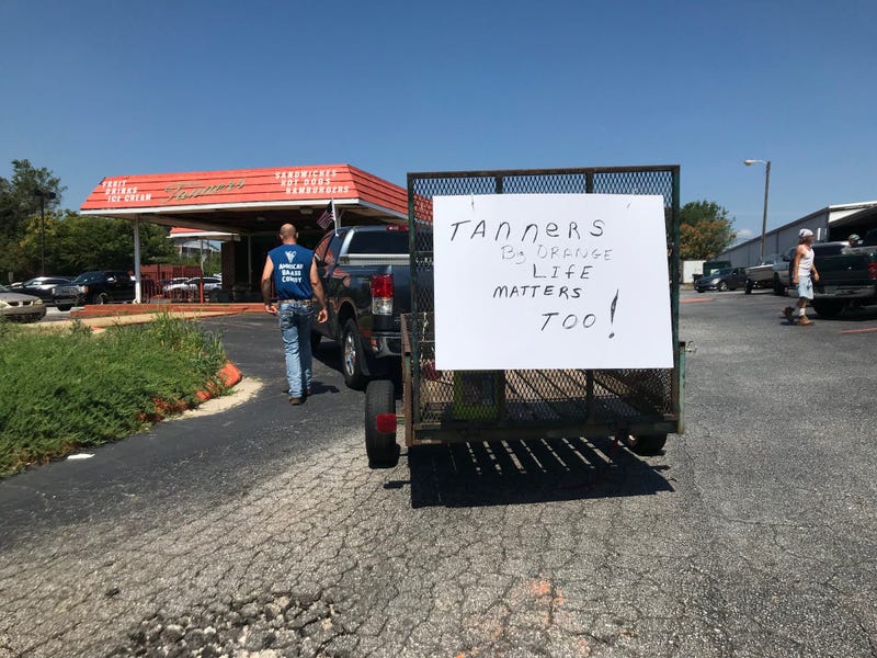 Anti-Protester Sign at Tanner's Big Orange - Emily Gill