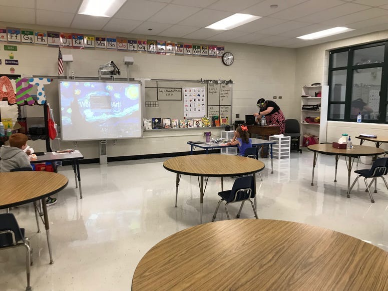 Students at Fountain Inn Elementary students spaced apart at their individual desks - Emily Gill