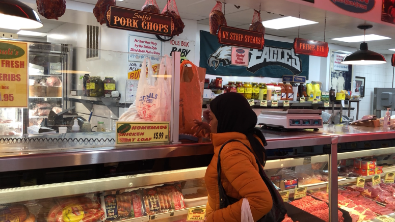 People picking up food at Canuli’s in the Italian Market.