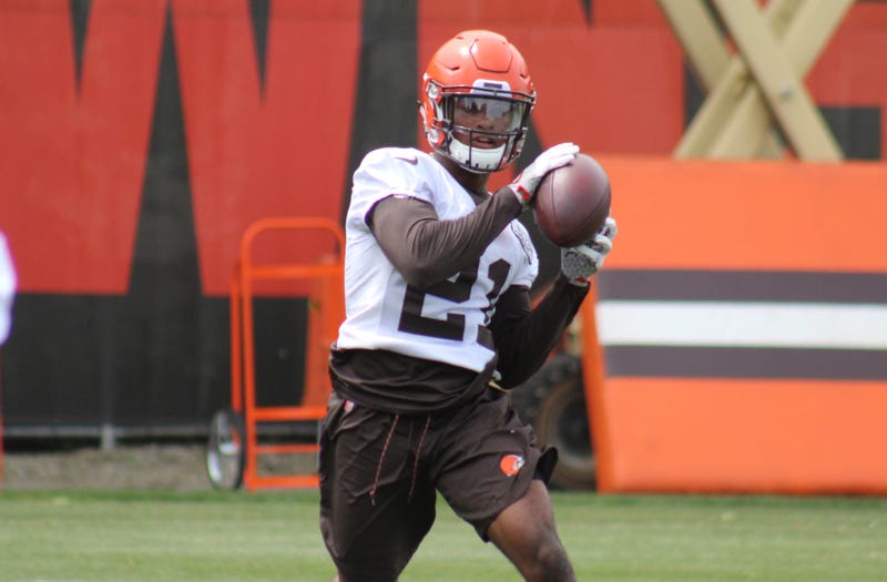 Browns rookie cornerback Denzel Ward catches a ball as part of an interception drill during June minicamp