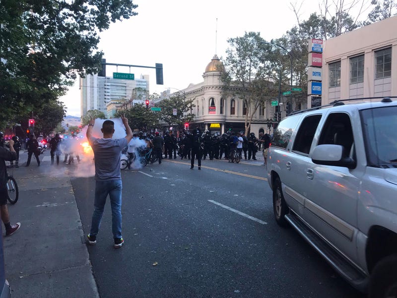 A small fire burns at a George Floyd protest in San Jose.