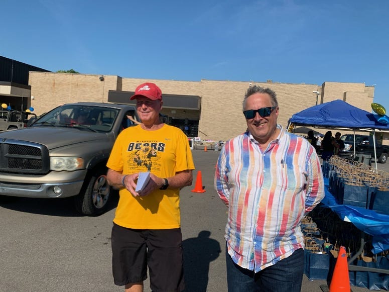 Peter Rose of Love Wyandotte with retired teacher John Garvie