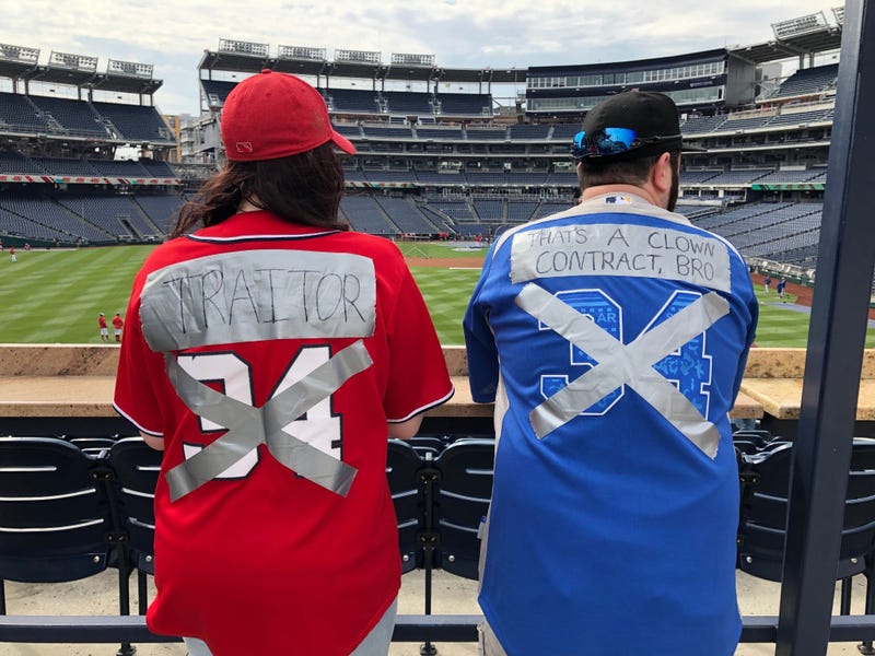 Two Nationals fans are no longer fans of Bryce Harper.