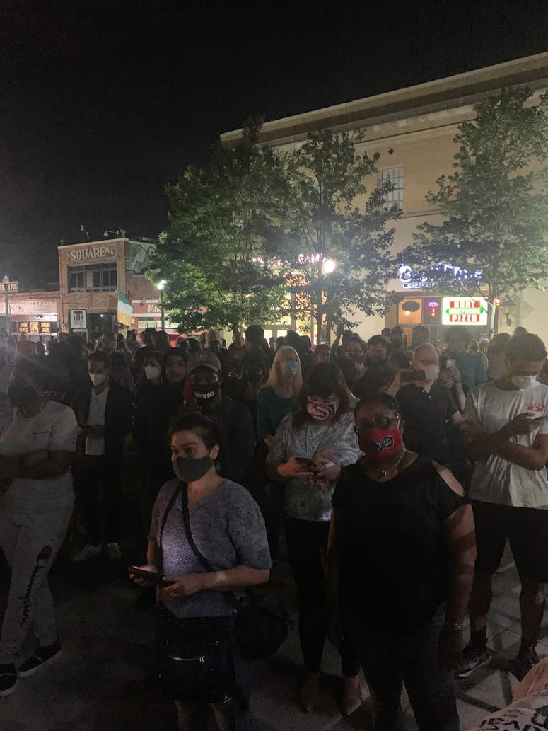 Hundreds gathered to watch the removal of the Confederate monument in Decatur Square