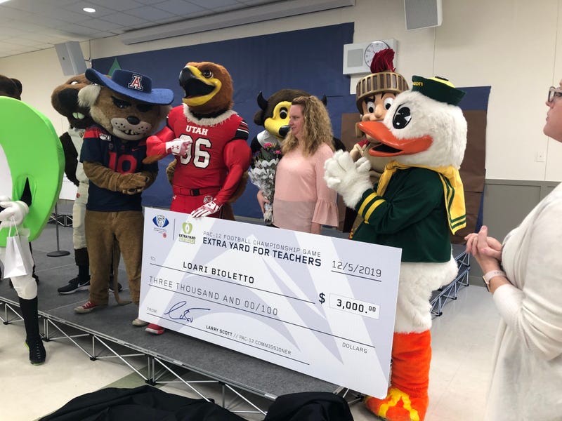 Pac-12 mascots deliver checks to San Jose schools