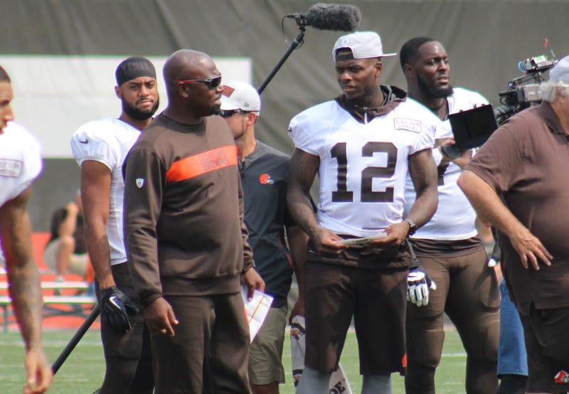 Browns receiver Josh Gordon chats with receivers coach Adam Henry during a practice on Aug. 19, 2018