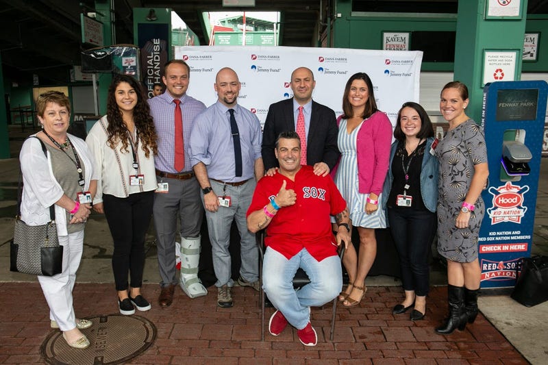 Lenny Intravesato, kidney cancer, with family, and Dr. Toni Choueiri.