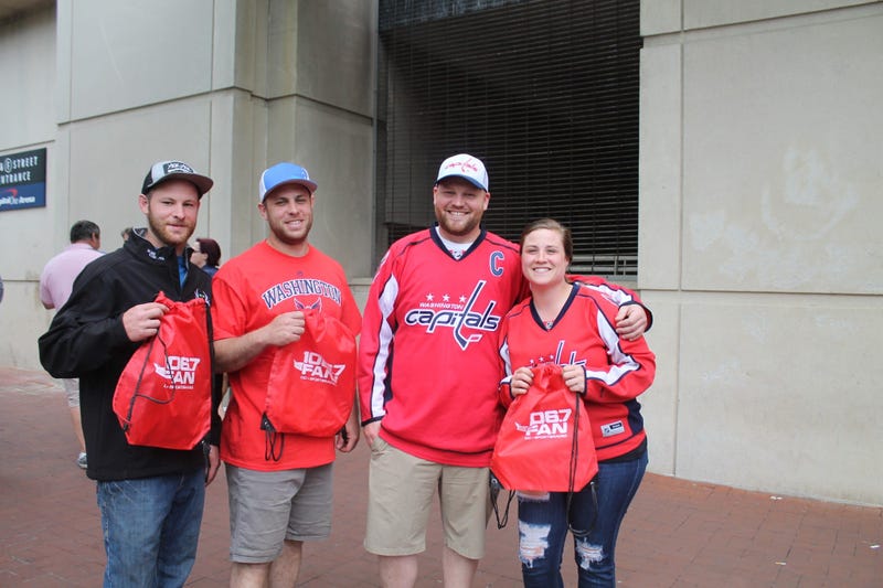 The 106.7 The Fan Street Team hangs out with fans before the Capitals vs. Penguins game at the Capitol One Arena.