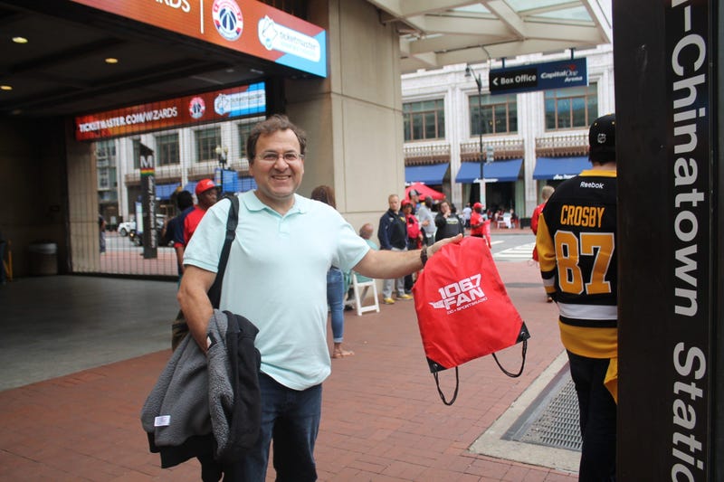 The 106.7 The Fan Street Team hangs out with fans before the Capitals vs. Penguins game at the Capitol One Arena.