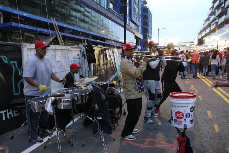 Performers entertain baseball fans before Game 4 of the World Series outside Nationals Park.