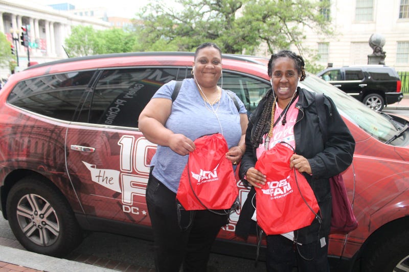 The 106.7 The Fan Street Team hangs out with fans before the Capitals vs. Penguins game at the Capitol One Arena.