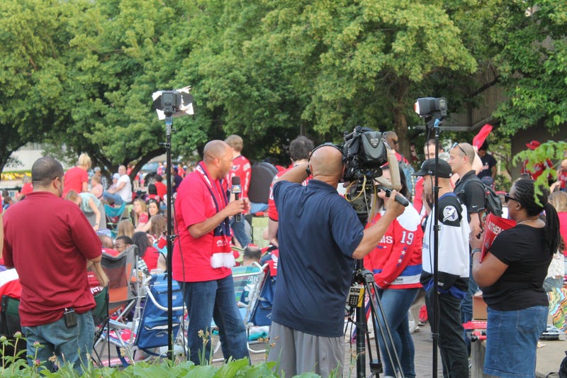 The 106.7 The Fan Street Team joins fans at a live viewing of the Capitals vs. Lighting game at Gateway Park, Rosslyn, VA.