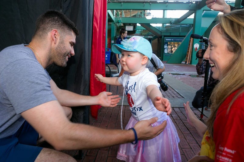 Hannah Serpa, 3, b-cell acute lymphoblastic leukemia, with J.D. Martinez and mom, Michelle.