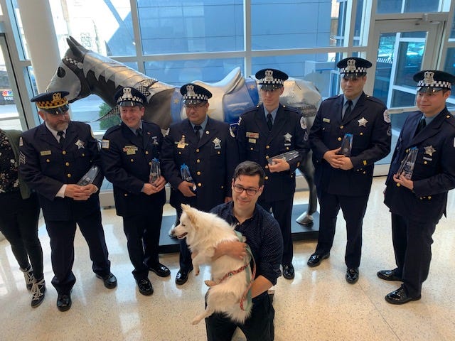Six Chicago Police officers were honored for their quick thinking after a Chicago man jumped into the icy waters of Lake Michigan to save his dog.