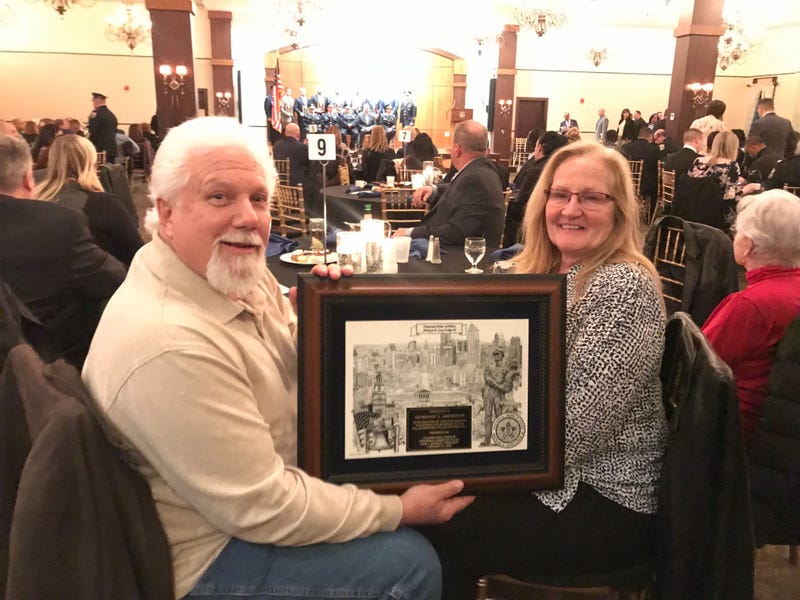 John and Joan Renshaw were recognized at the Fraternal Order of Police Awards after it was discovered they secretly maintained the memorial of Officer Joseph Friel for ten years.