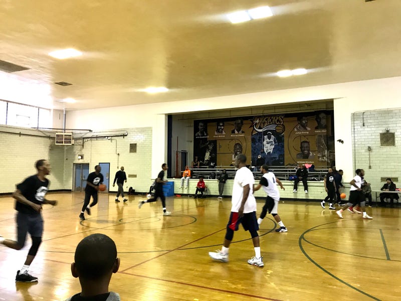 Young boys and men from all walks of life united to take part in the "Play 4 Peace" basketball game in East Germantown.