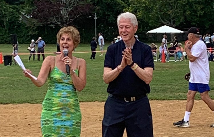 Juliet Papa and former President Bill Clinton at the 2019 game