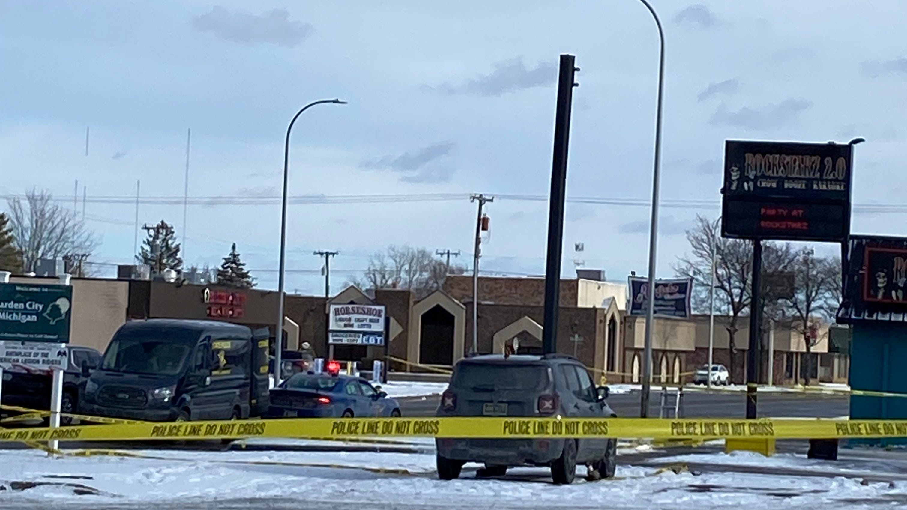 Police conducting "active investigation" after two were shot at Garden City bar on New Year's morning, suspect in custody