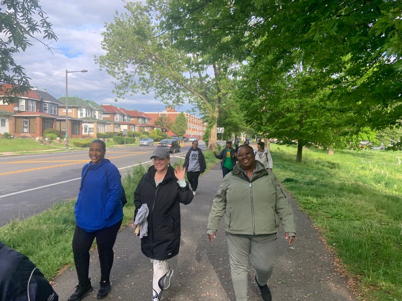 Participants of We Walk PHL during a walk through Cobb's Creek.