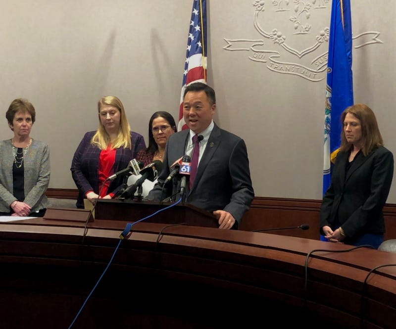 Attorney General William Tong stands at the podium at the State Capitol.