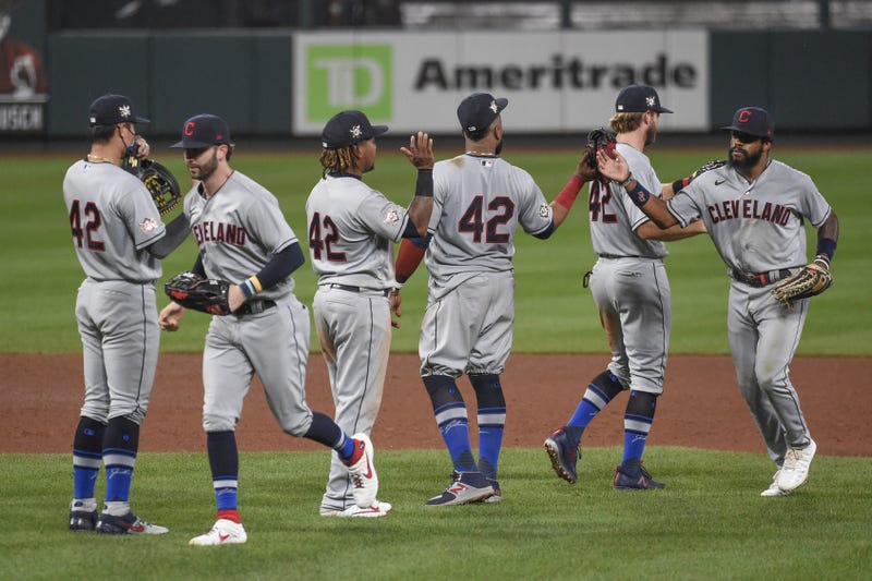 Members of the Cleveland Indians react after beating the St. Louis Cardinals at Busch Stadium.