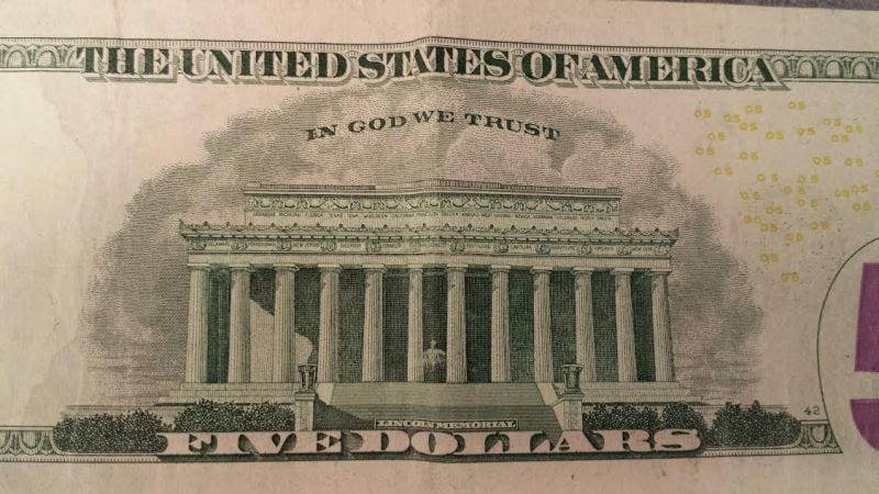 A five-dollar bill.