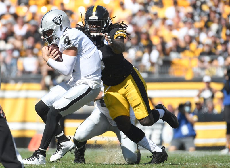 Melvin Ingram sacks Derek Carr