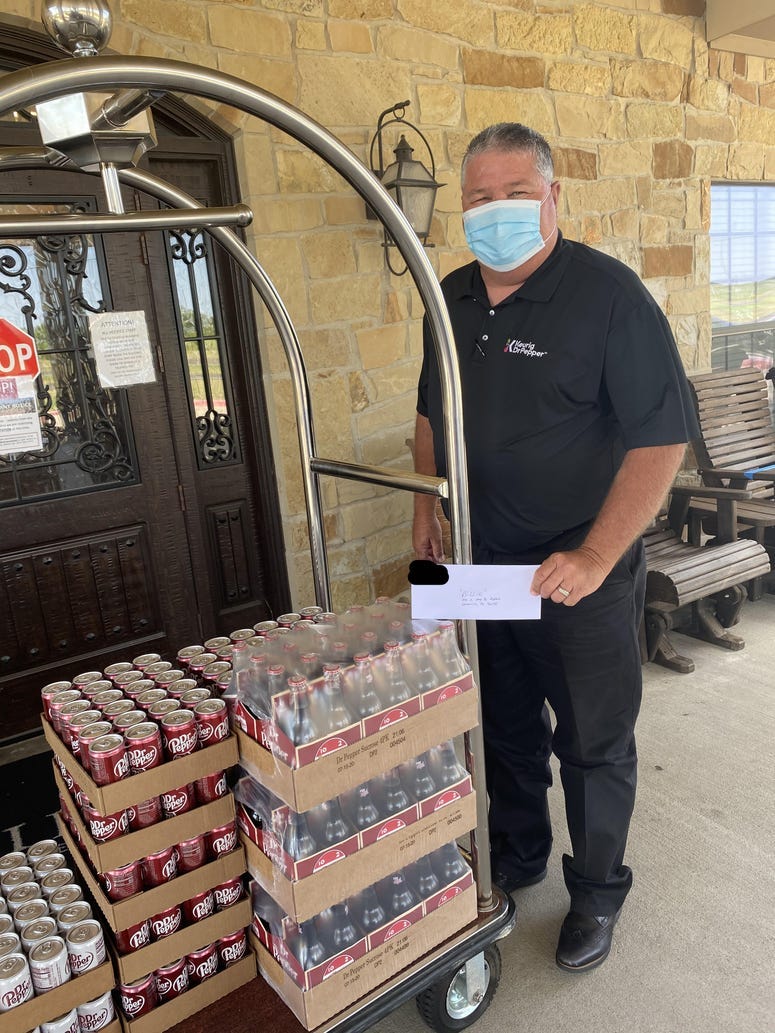 Dr. Pepper delivers 16 cases of drinks to Hillside Medical Lodge.